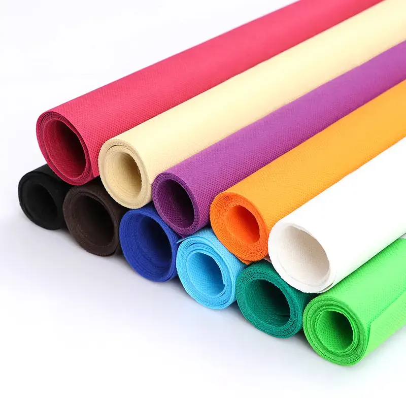 चीन कारखाने Polypropylene Spunbond गैर बुना कपड़े रोल निर्माता रंगीन पीपी Nonwoven कपड़े