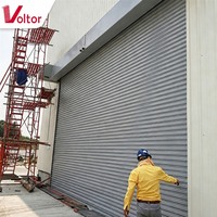 Porte de garage industrielle enroulable en acier de sécurité personnalisée, résistante au vent, avec télécommande, fabricant de portes enroulables