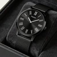 Montre chronographe à quartz pour homme en acier inoxydable argenté avec cadran noir de 44 mm et bracelet en maille d'acier inoxydable de 22 mm