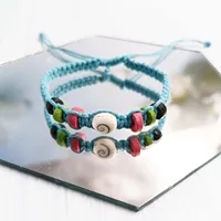 Bracelet unisexe artisanal Dk Bali réglable avec perles coquillage Œil de Shiva et pompon macramé, style décontracté/sportif, pour la mode unisexe