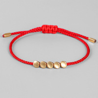 Pulsera budista tibetana trenzada hecha a mano creativa de nuevo diseño, pulsera de cuerda de la suerte con cuentas de cobre irregulares para hombres y mujeres, joyería