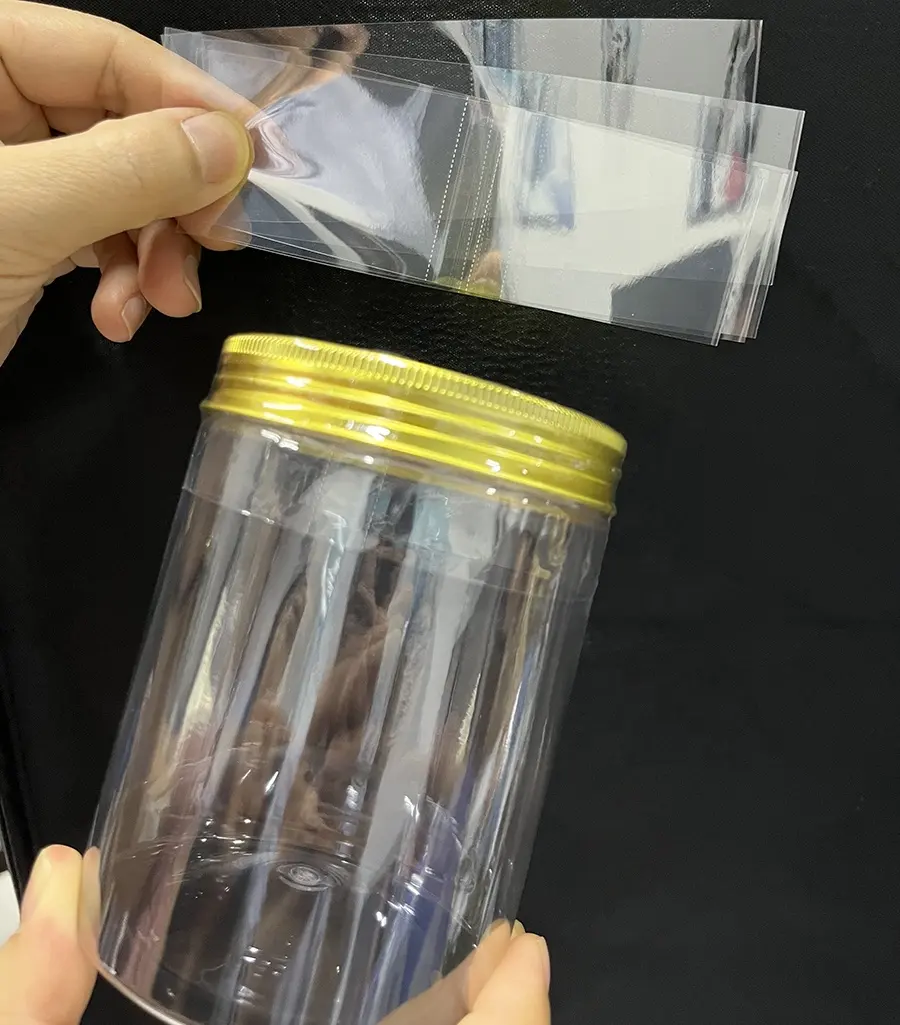 Özel baskı delikli ısı büzüşmeli makaron bantları Shrink güvenli mühürlü bant PET şişe boyunlu kavanoz kapak contası