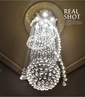 Lustre suspendu en cristal long pour escalier duplex, lampe LED rotative moderne et minimaliste pour salon et villa