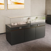 Vitrine d'exposition pour bijoux et objets de musée avec éclairage LED, design sans dos, verre transparent, personnalisable, gris