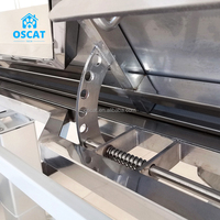 Table d'opération vétérinaire OSCAT en acier inoxydable 304 avec surface mosaïque inclinable et levage électrique pour usage vétérinaire