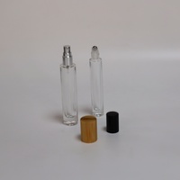 Flacon de parfum rond portable de 10 ml et 15 ml, flacon rond en verre transparent vide avec vaporisateur à bille, couvercle noir, surcapuchon en bambou