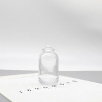 Vente en gros de flacons de parfum en verre en forme de fleur personnalisés de 30 ml, 50 ml, 100 ml, avec pulvérisateur à pompe, impression sérigraphique, différents types de bouchons, emballage en boîte