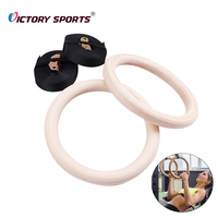 Anneaux de gymnastique en bois personnalisés pour l'entraînement musculaire avec sangle réglable