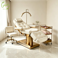 Lit de beauté électrique de luxe avec base dorée, lit de massage en cuir, lit de soin du visage et des cils pour salon, lit esthétique pour esthéticienne