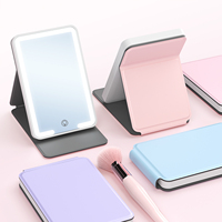 Mignon miroir de maquillage portable pliable avec lumière LED intégrée, format mini, avec étui en cuir PU