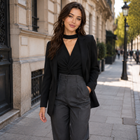 Haut en tricot élégant pour femme, col montant, manches bouffantes, peplum fendu, torsadé sur le devant, en mélange de laine personnalisé