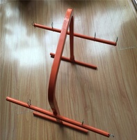 Support pliable en fil d'acier pour bobines et outils