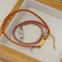 Bracelet tendance en acier inoxydable plaqué or 18 carats avec breloque corde rouge et strass, style classique, pour femmes