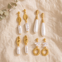 Boucles d'oreilles pendantes en acier inoxydable texturé, motif feuille de perle irrégulière, pour femme, bijoux de niche délicats et élégants, vente chaude