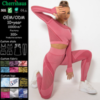 En stock Ensemble short et haut de yoga sans couture en maille respirante à manches longues pour la gym, l'exercice et le fitness pour femmes