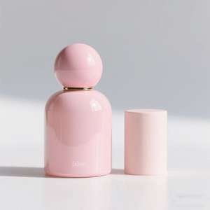 Botella de perfume de nicho de lujo de 50ml, cuerpo suave y brillante con tapa esférica de tono rosa desnudo suave, botella de vidrio personalizable para <span class=keywords><strong>marca</strong></span> - Product Image 1