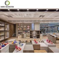 Vente en gros de chaussures de présentation d'intégration d'usine Étagère de présentation de magasin de conception Étagère de vitrine Magasin de détail