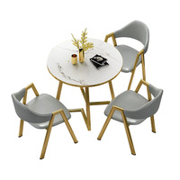 Ensemble de table à manger moderne de luxe en gros avec 4 chaises en cuir pour visiteurs, chaise d'hôtel, pieds en métal, plateau de table en bois, mobilier de maison