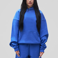 Ensemble de survêtement épais en molleton avec sweat à capuche et pantalon de jogging, poche kangourou, logo personnalisé imprimé en relief, coupe oversize pour femme, vente en gros