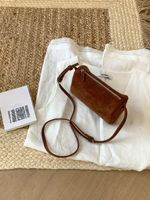 Sac bandoulière en daim pour femme, style rétro de luxe, sacs à main simples et décontractés, sacs à bandoulière pour femme avec logo personnalisé, faible MOQ