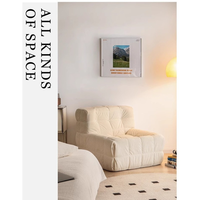 Sofá sin marco amarillo de un solo asiento lujoso moderno, sofá minimalista, con cubierta de cama de sala de estar de tela de madera comprimida al vacío.