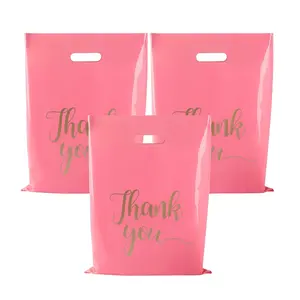 Sacs à provisions en plastique brillant avec logo personnalisé avec poignées découpées pour emballage de cadeaux de boutique de détail d'affaires
