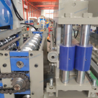 Machine de formage à rouleaux triple couche : Une machine pour la production de tuiles émaillées, de tôles ondulées à effet d'eau et de panneaux de toiture.