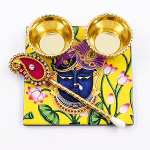 Handcrafted Shrinathji Pichwai Art Tilak Platter Set with Golden Roli Chawal Katori and Embellished Paisley Stick For Diwali - Product Image 1