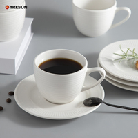 Vente en gros de vaisselle personnalisée de 200 ml, tasse à thé et à café blanche, tasse et soucoupe en céramique de porcelaine de luxe en relief