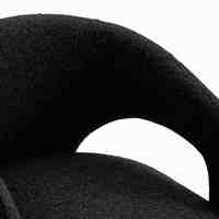 Fauteuil contemporain noir en bouclette avec base intégrée et pieds en métal, chaise de salle à manger sculpturale pour mobilier de maison, salon et salle à manger