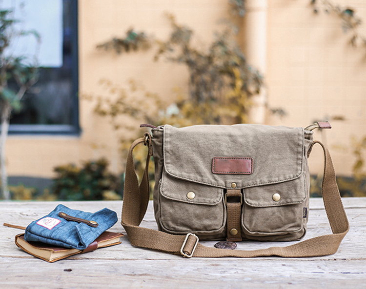 green canvas messenger bag