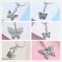 Date Creative Guyin en alliage de Zinc papillon printemps/été série porte-clés voiture suspendus accessoires usine directe en gros