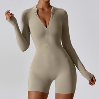 Vente en gros de combinaisons sexy pour femmes, tailles S-XL, manches longues avec fermeture éclair, coupe ajustée, vêtements de sport actifs, combinaison de yoga