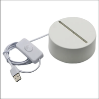 Lampe de chevet LED moderne noire et blanche, base en acrylique, alimentée par piles, lumière circulaire 3D pour chambre à coucher