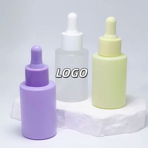 ขวดแก้วหยดสีชมพู ฟ้า และสีเหลืองอำพัน ขนาด 30 มล. สำหรับเซรั่มบำรุงผิวและน้ำมันหอมระเหย มีสินค้าในสต็อก - Product Image 1