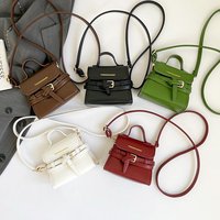 2026 Neue Trendige Bonbonfarbene Mädchen-Minihandtasche aus PU-Leder Modische Damen-Geldbörse Tragbare Frauen-Mini-Umhängetasche