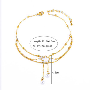 Nouvelle <span class=keywords><strong>Chaîne</strong></span> <span class=keywords><strong>de</strong></span> <span class=keywords><strong>Cheville</strong></span> Femme Tendance en Acier Inoxydable, Coquille Blanche, Fleur à Cinq Feuilles, Pompon et Perle, Triple Couche, Bijoux - Product Image 6