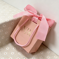 Sacs cadeaux de luxe en papier avec logo personnalisé, ruban en soie, poignée en nœud, sacs en carton blanc pour mariage avec nœuds décoratifs