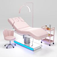 Cama de belleza eléctrica de lujo para salón de Spa, cama Robot de masaje para salón, mesa de masaje portátil moderna, cabezal Facial de madera, cama de masaje