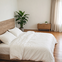 Parure de lit en lin en gros – Lin français 4 pièces uni pour hôtels : 1 housse de couette, 1 drap-housse, 2 taies d'oreiller