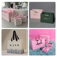 Sacs cadeaux en papier bleu mat de luxe avec logo imprimé personnalisé, emballage avec poignée en ruban