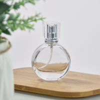 Flacon de parfum en verre transparent rond rechargeable de 25 ml avec pompe pulvérisatrice, sérigraphie, diffuseur de roseaux portable pour voyage