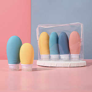Vente en gros de kits de voyage portables et rechargeables sans BPA de qualité alimentaire, 60 ml, 100 ml, flacons souples en silicone pour shampooing et cosmétiques - Product Image 1