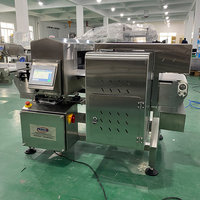 Sistema automático de detección de metales para alimentos de alta precisión con protección IP65 Detección ferrosa de 0,8mm para la industria alimentaria
