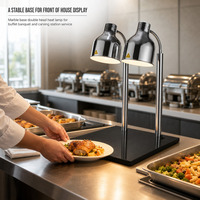 Marmeren voet dubbele kop warmtelamp voor het warmhouden van voedsel in restaurantbuffet en cateringpresentatie.