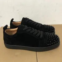 black spike shoes with red bottoms