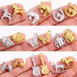 Chaud En Acier Inoxydable Chanceux Fer À Cheval Abeille Papillon Charmes Soleil Guitare Pendentif pour Collier Bracelet Boucle D'oreille Fabrication De Bijoux Trouver - Product Image 1