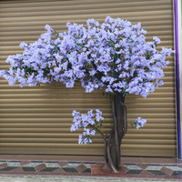 Arbre artificiel Jacaranda personnalisé pour mariage au restaurant KH, avec différentes options de style