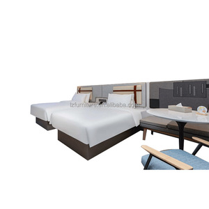 Lits jumeaux minimalistes à cadre en bois avec tête de lit rembourrée douce pour hôtel, boutique ou chambre d'hôtel 3 étoiles - Ensemble de mobilier commercial - Product Image 2