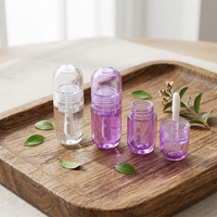 Tube de brillant à lèvres de luxe 3 ml en forme de capsule avec applicateur à grande brosse, contenant vide transparent pour cosmétiques colorés de boutique